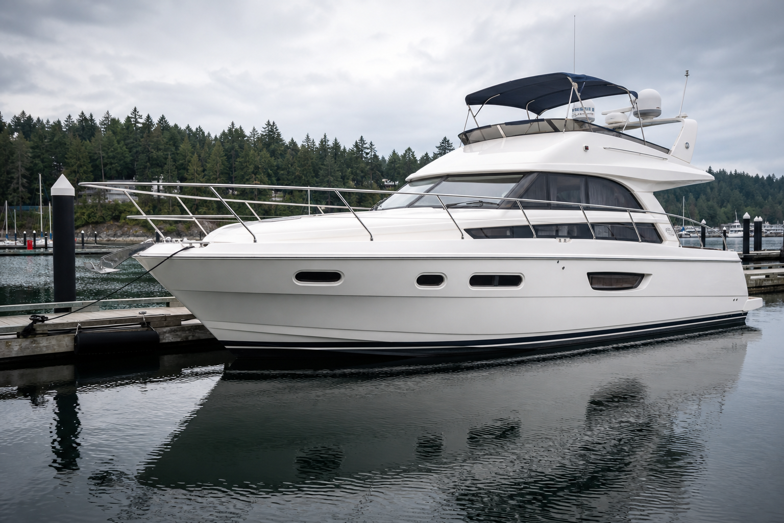 Clean white motor yacht prepared by a professional boat-detailing service